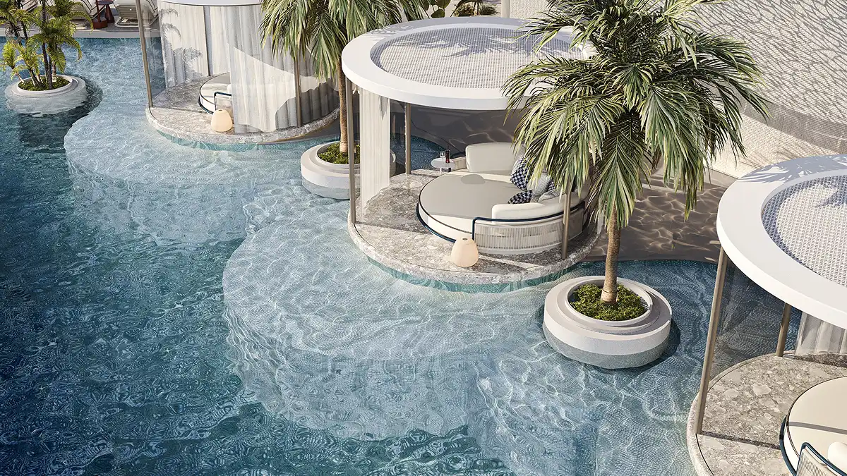 A secluded over-water cabana surrounded by crystal-clear pool waters and gently swaying palm trees.