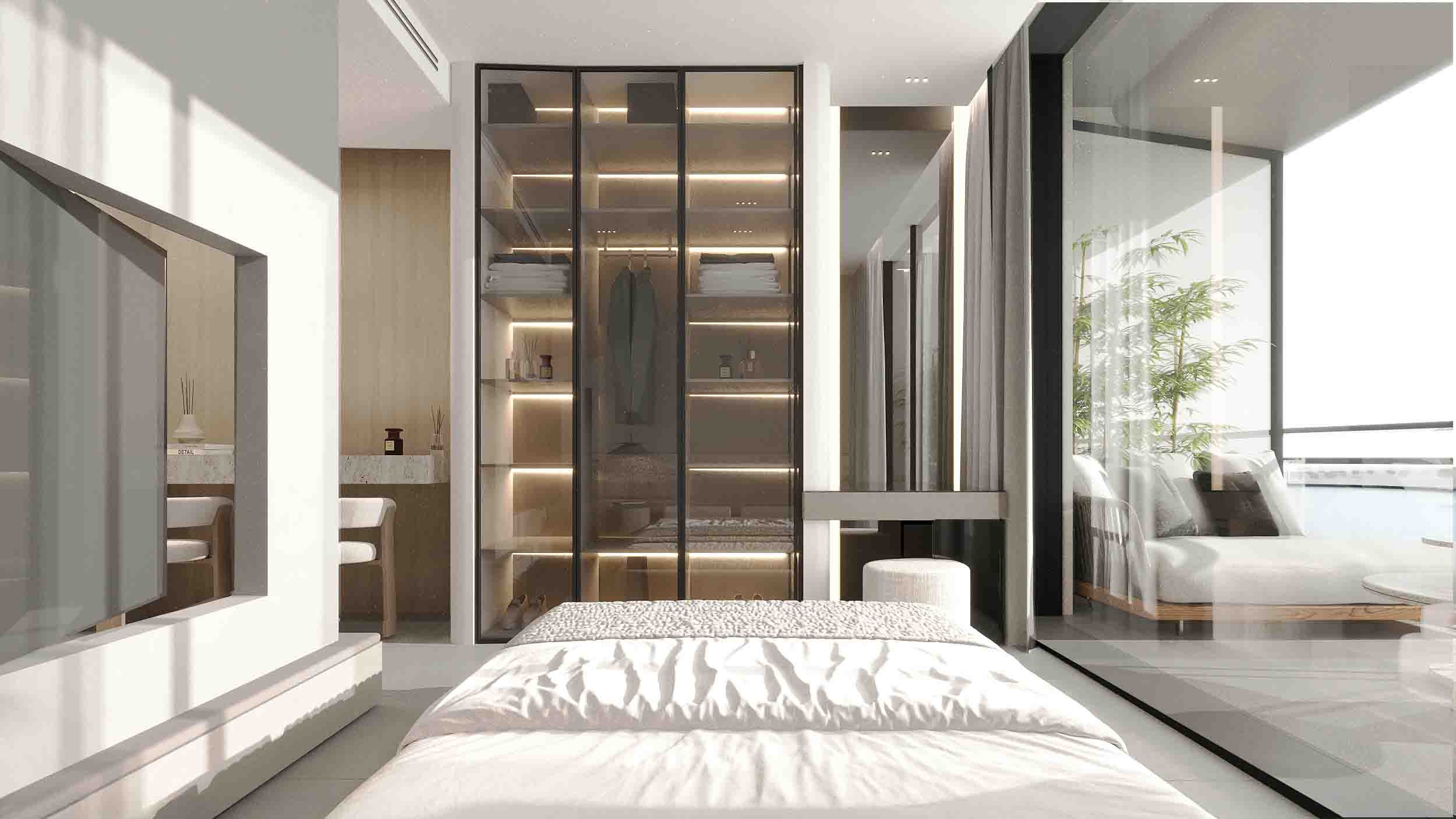 Bright bedroom with illuminated glass wardrobe, minimalist desk and balcony access.