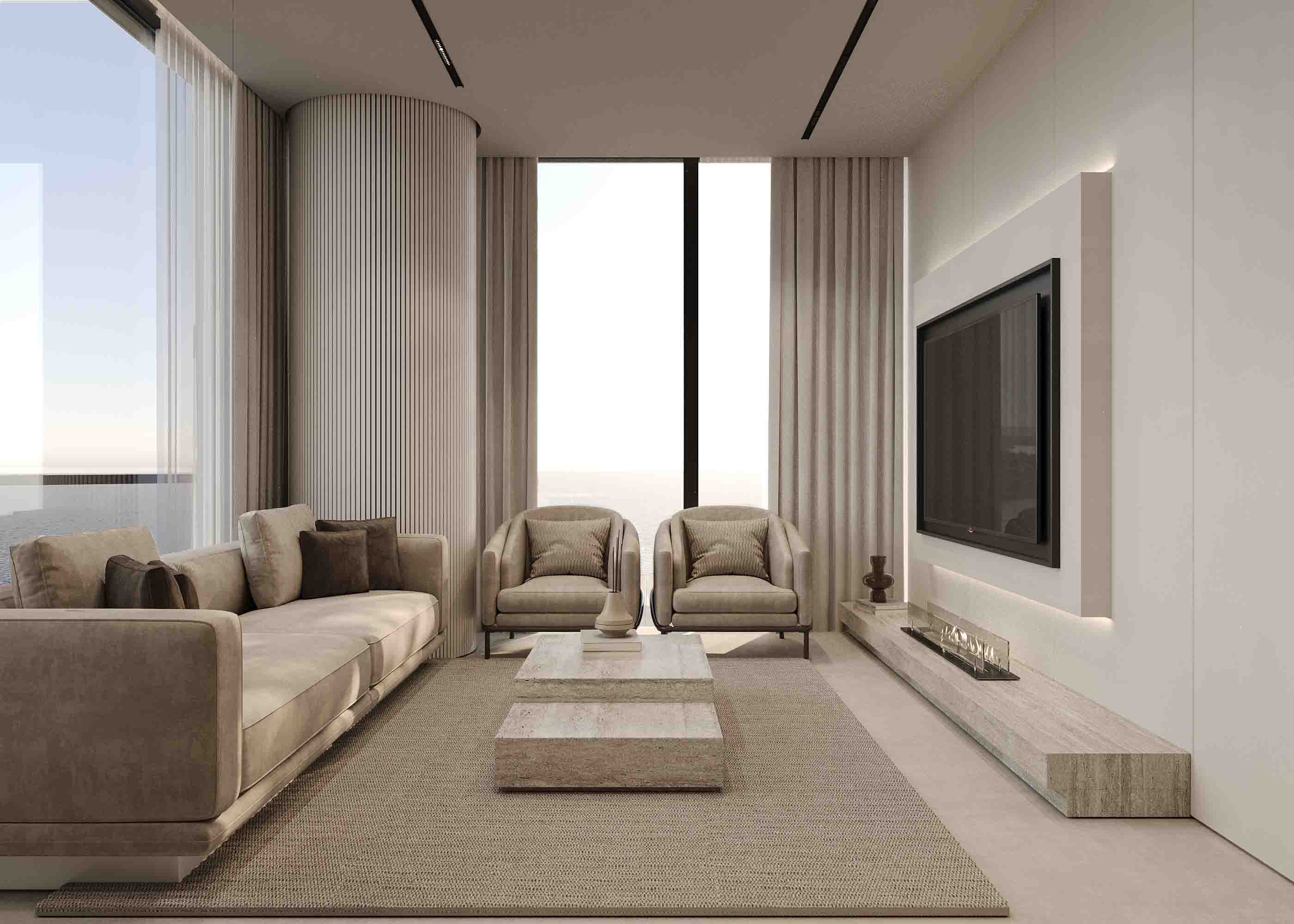 Spacious lounge with plush sofa, twin armchairs and full-height windows flooding the room with natural light.