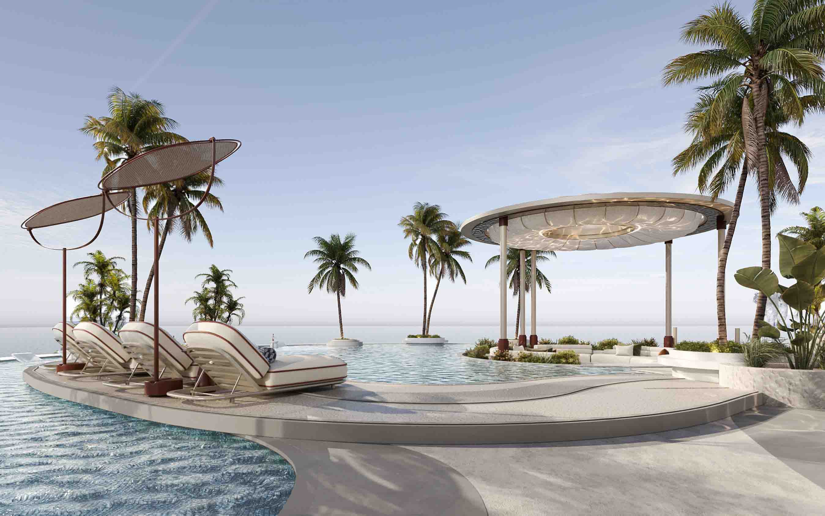 Infinity pool deck with sculptural loungers and a circular shaded pavilion framed by palm trees.