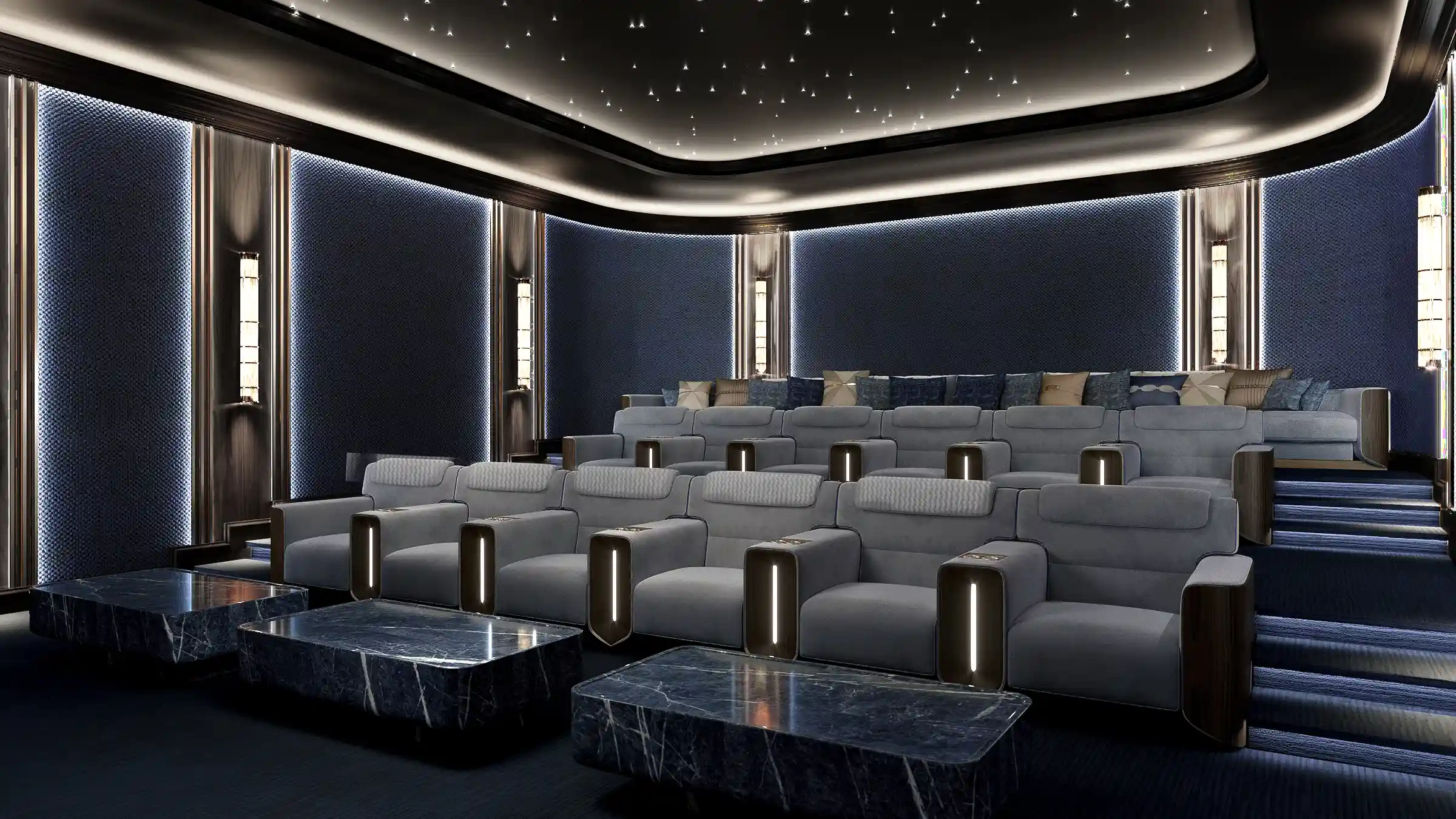 A luxurious cinema room featuring reclining seats, marble tables, and a starlit ceiling for an elevated movie experience.