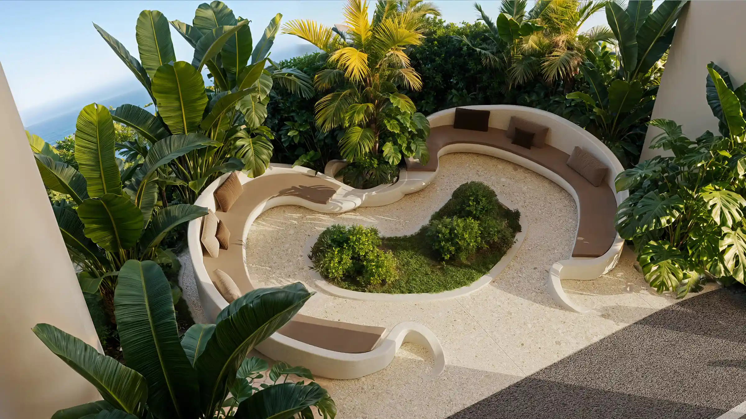 A cozy sunken outdoor lounge surrounded by lush plants, ideal for quiet moments and mindful relaxation.